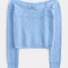 Maglione a spalle scoperte in stile uncinetto Maglione a spalle scoperte in stile uncinetto