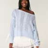 Maglione a trecce con maniche a fiocco