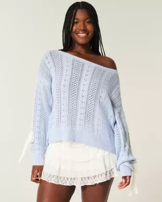 Maglione a trecce con maniche a fiocco