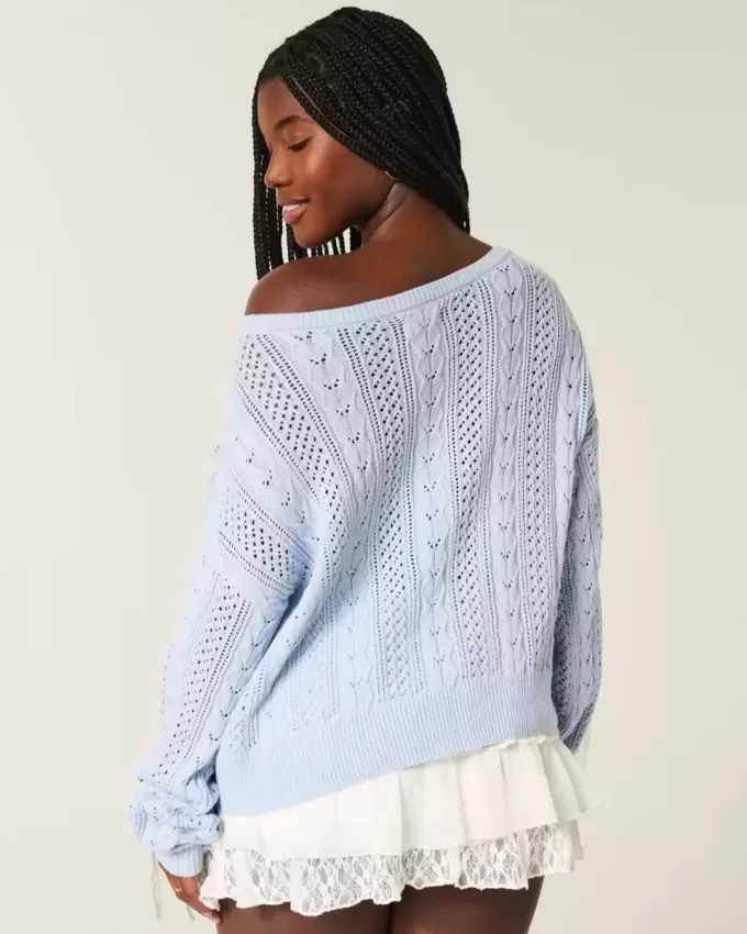 Maglione a trecce con maniche a fiocco