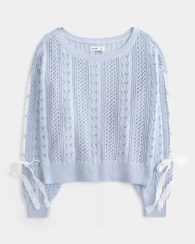 Maglione a trecce con maniche a fiocco