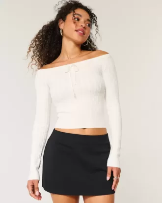 Maglione a trecce con spalle scoperte
