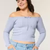 Maglione a trecce con spalle scoperte Maglione a trecce con spalle scoperte