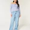 Maglione a trecce con spalle scoperte Maglione a trecce con spalle scoperte