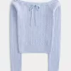 Maglione a trecce con spalle scoperte Maglione a trecce con spalle scoperte