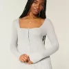 Maglione babydoll a maniche lunghe e scollo quadrato