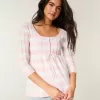 Maglione babydoll a trecce