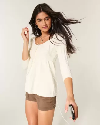 Maglione babydoll a trecce