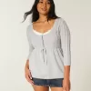 Maglione babydoll a trecce