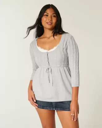 Maglione babydoll a trecce
