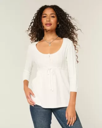 Maglione babydoll a trecce