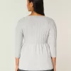 Maglione babydoll a trecce