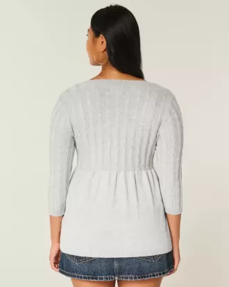 Maglione babydoll a trecce
