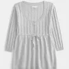 Maglione babydoll a trecce