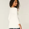 Maglione babydoll a trecce