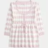 Maglione babydoll a trecce