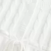 Maglione babydoll a trecce