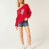 Maglione con bandiera a cuore e spalle scoperte Maglione con bandiera a cuore e spalle scoperte
