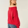 Maglione con bandiera a cuore e spalle scoperte Maglione con bandiera a cuore e spalle scoperte