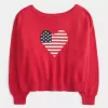 Maglione con bandiera a cuore e spalle scoperte Maglione con bandiera a cuore e spalle scoperte