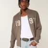 Maglione con cerniera e grafica numerica rilassata