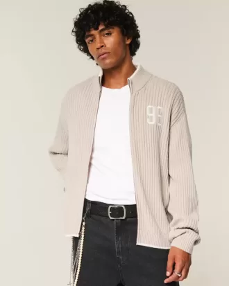 Maglione con cerniera e grafica numerica rilassata