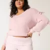 Maglione con fiocco applicato a spalle scoperte Maglione con fiocco applicato a spalle scoperte