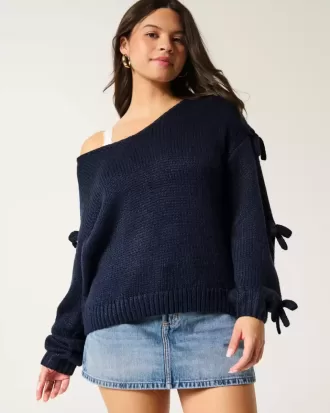 Maglione con fiocco applicato a spalle scoperte