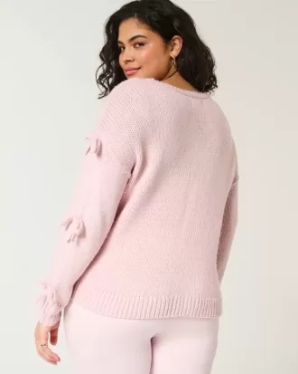 Maglione con fiocco applicato a spalle scoperte