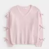Maglione con fiocco applicato a spalle scoperte Maglione con fiocco applicato a spalle scoperte