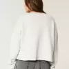 Maglione con scollo a V e grafica Hollister Comfy Cloud Maglione con scollo a V e grafica Hollister Comfy Cloud