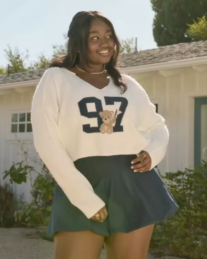 Maglione con scollo a V e grafica Hollister Comfy Cloud