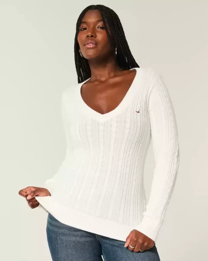 Maglione con scollo a V e lavorazione a trecce