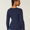 Maglione con scollo a V e lavorazione a trecce