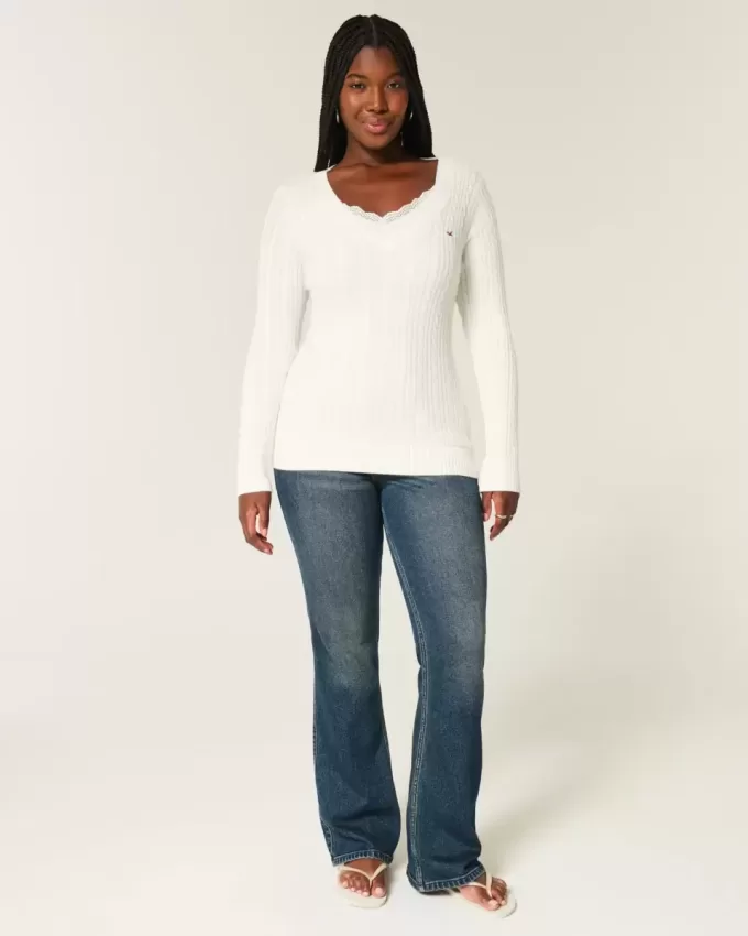 Maglione con scollo a V e lavorazione a trecce