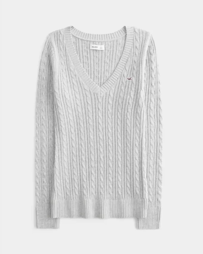Maglione con scollo a V e lavorazione a trecce