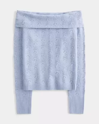 Maglione con spalle scoperte e cuciture
