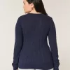 Maglione girocollo con fiocco in maglia a trecce