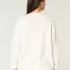 Maglione girocollo con grafica bandiera americana Comfy Cloud di Hollister