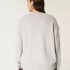 Maglione girocollo con grafica Hollister Comfy Cloud Puppy Maglione girocollo con grafica Hollister Comfy Cloud Puppy