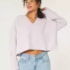 Maglione Hollister Comfy Cloud Boxy con scollo a V Maglione Hollister Comfy Cloud Boxy con scollo a V