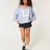 Maglione Hollister Comfy Cloud Easy con stampa a spalle scoperte e numero Maglione Hollister Comfy Cloud Easy con stampa a spalle scoperte e numero