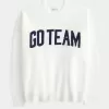 Maglione Hollister Comfy Cloud Oversized Go Team Graphic Maglione Hollister Comfy Cloud Oversized Go Team Graphic
