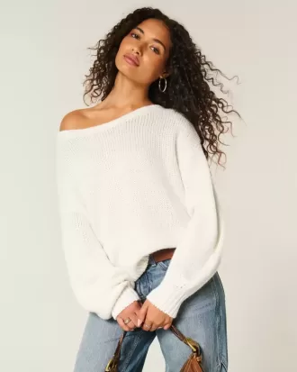 Maglione largo con spalle scoperte