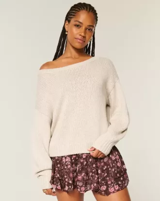 Maglione largo con spalle scoperte