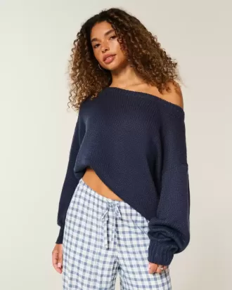 Maglione largo con spalle scoperte