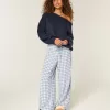 Maglione largo con spalle scoperte