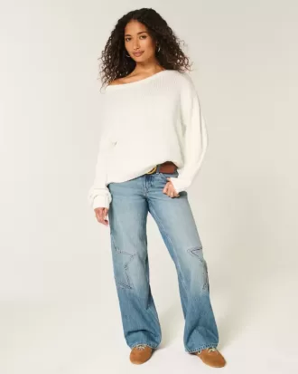 Maglione largo con spalle scoperte
