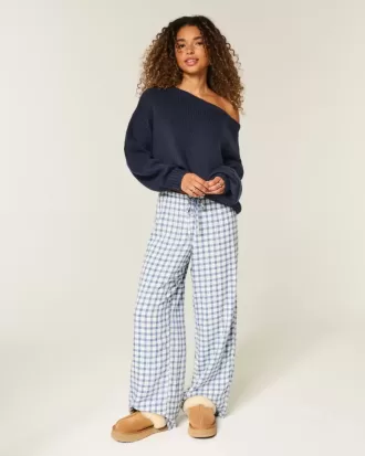 Maglione largo con spalle scoperte