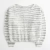 Maglione largo con spalle scoperte